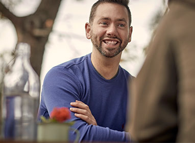 Plasma recipient Nick sitting in a cafe